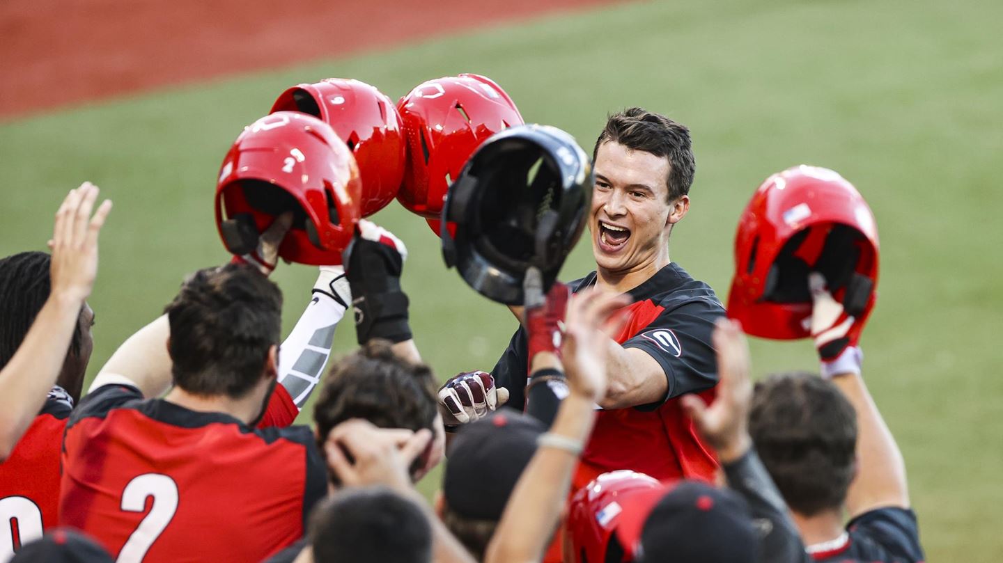 Ben Harris greeted at home plate by his Georgia teammates